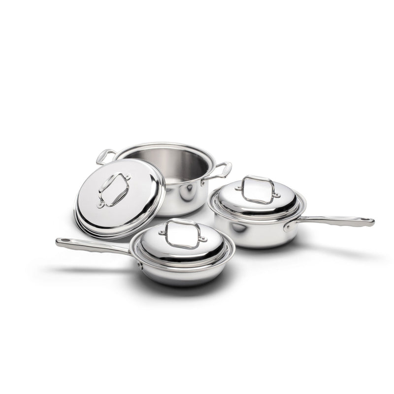 Set of stainless steel cookware on a white background