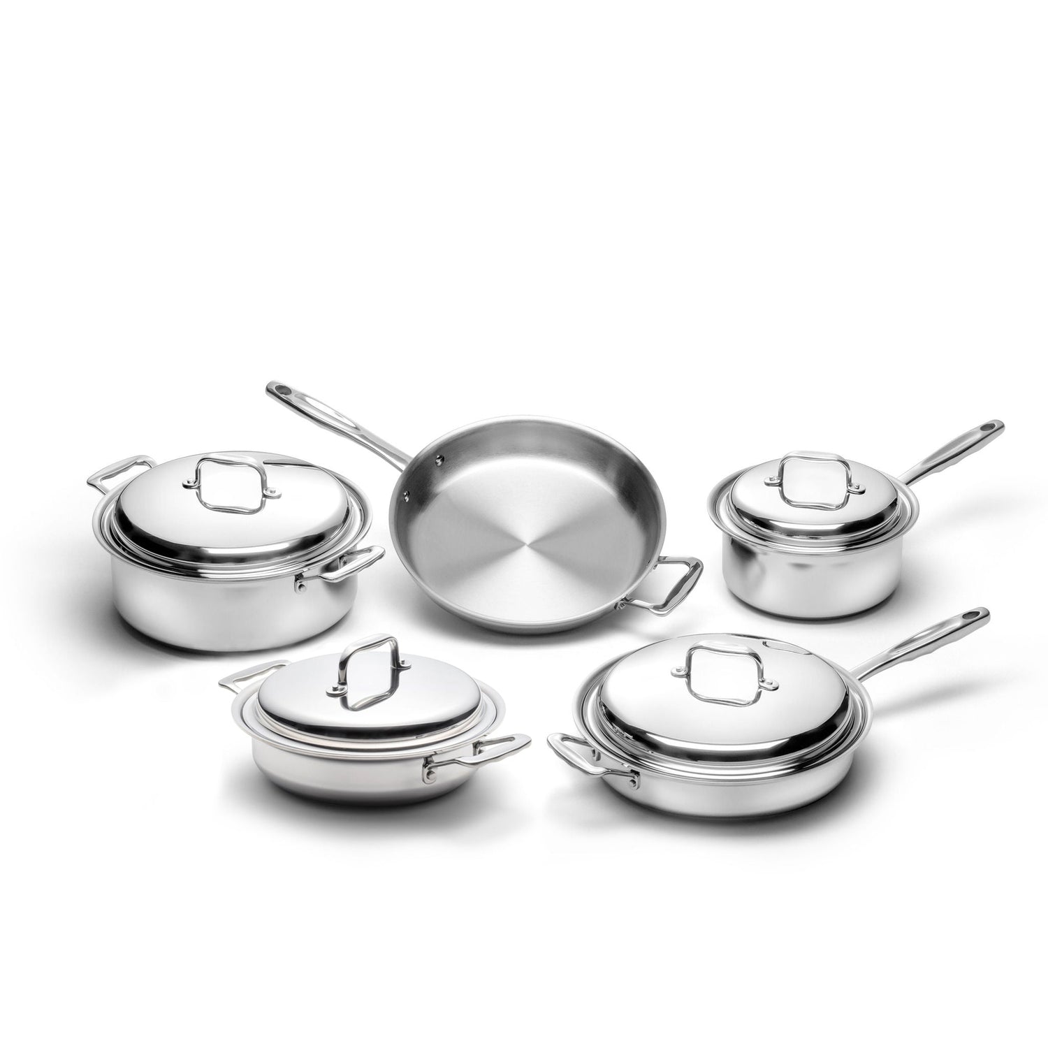 Set of stainless steel cookware with lids on a white background