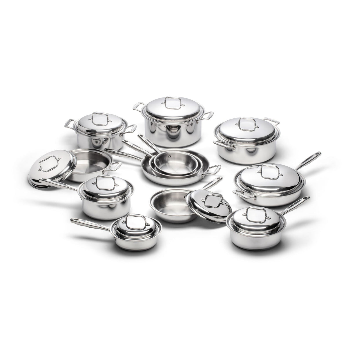 Set of stainless steel cookware on a white background