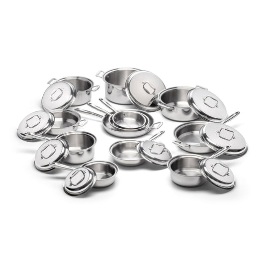Set of stainless steel cookware with lids on a white background