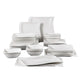 Set of white ceramic dinnerware including bowls and plates on a white background