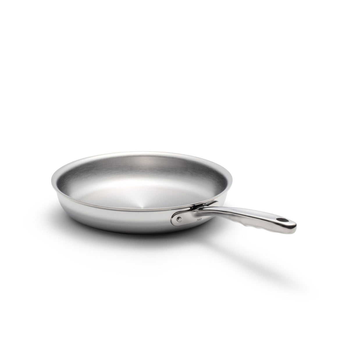 Stainless steel frying pan on a white background