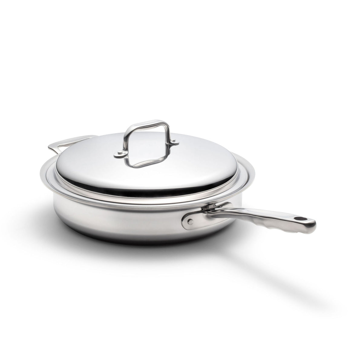 Stainless steel frying pan with lid on a white background
