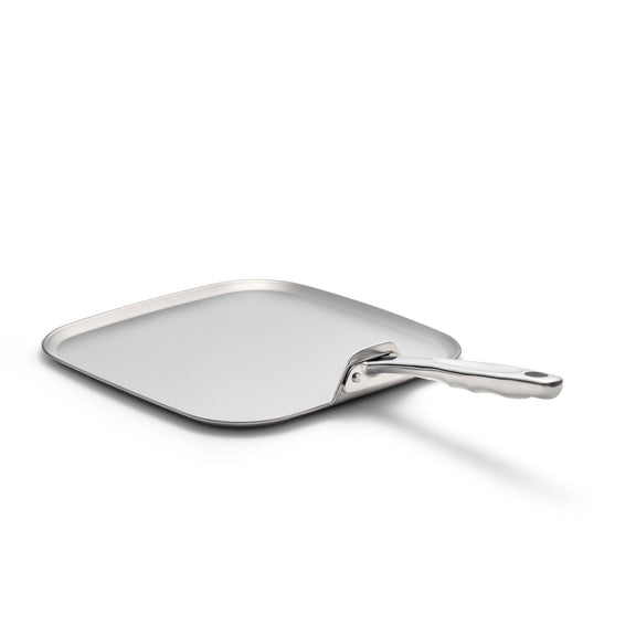 Metal spatula on a white background