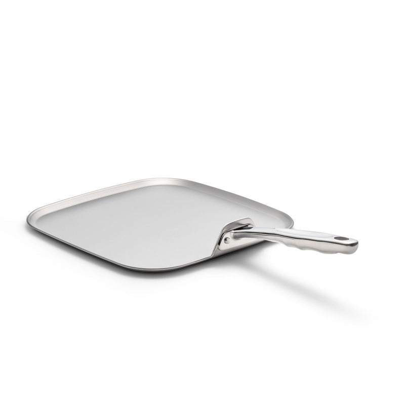 Metal spatula on a white background