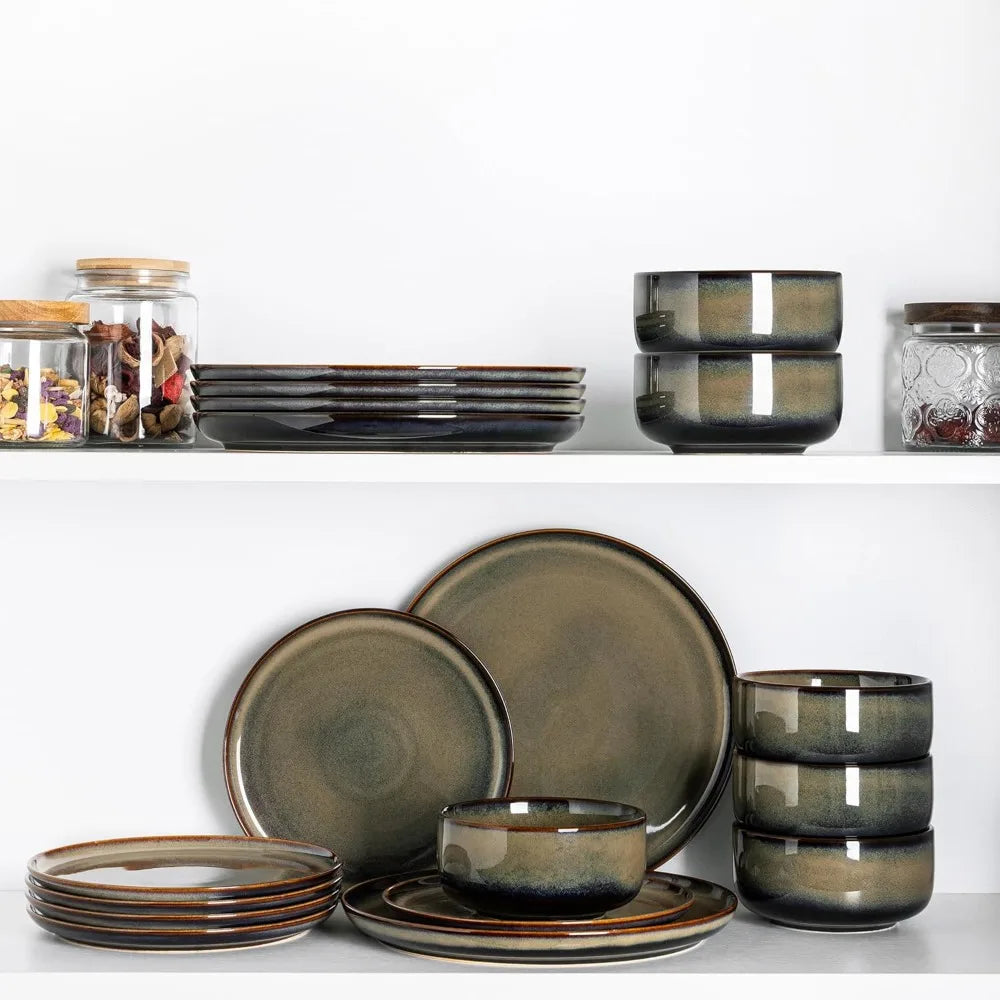 Set of ceramic dinnerware with a brownish-green glaze on a white background