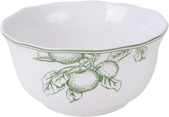 White bowl with green fruit design on a white background