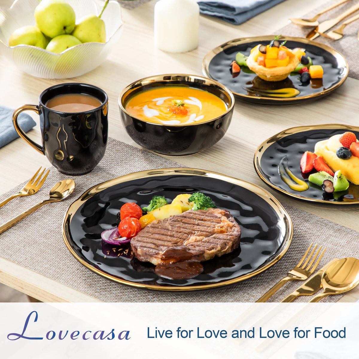 Dining table setting with black plates, gold cutlery, and a Lovecasa logo.