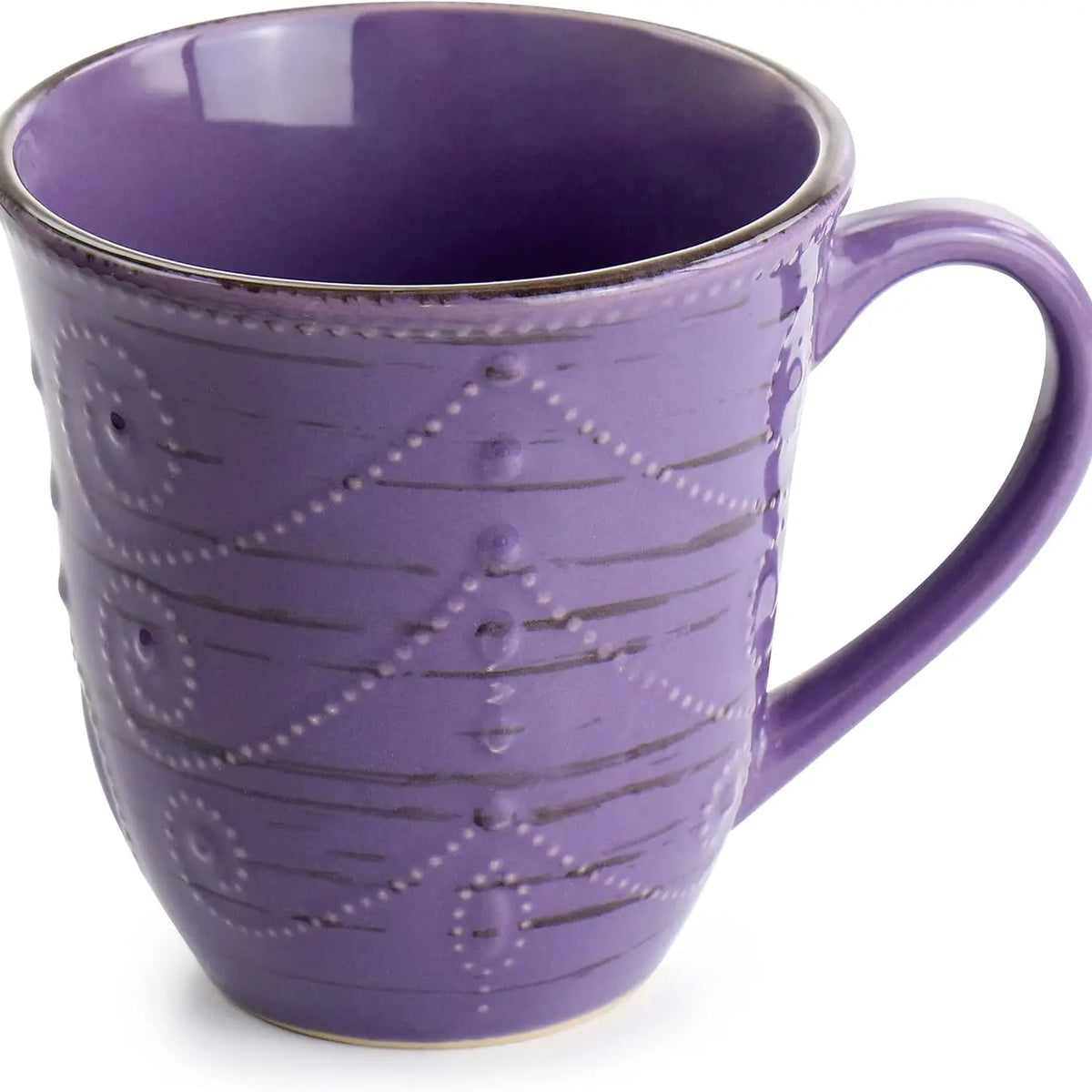 Purple ceramic mug with decorative patterns on a white background