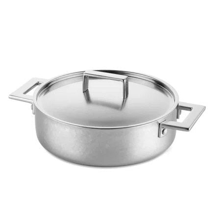 Stainless steel pot with lid on a white background