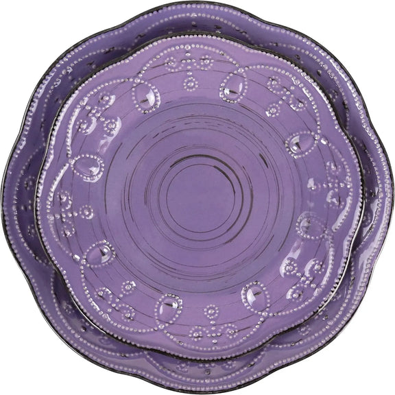 Set of purple decorative plates with intricate patterns on a white background