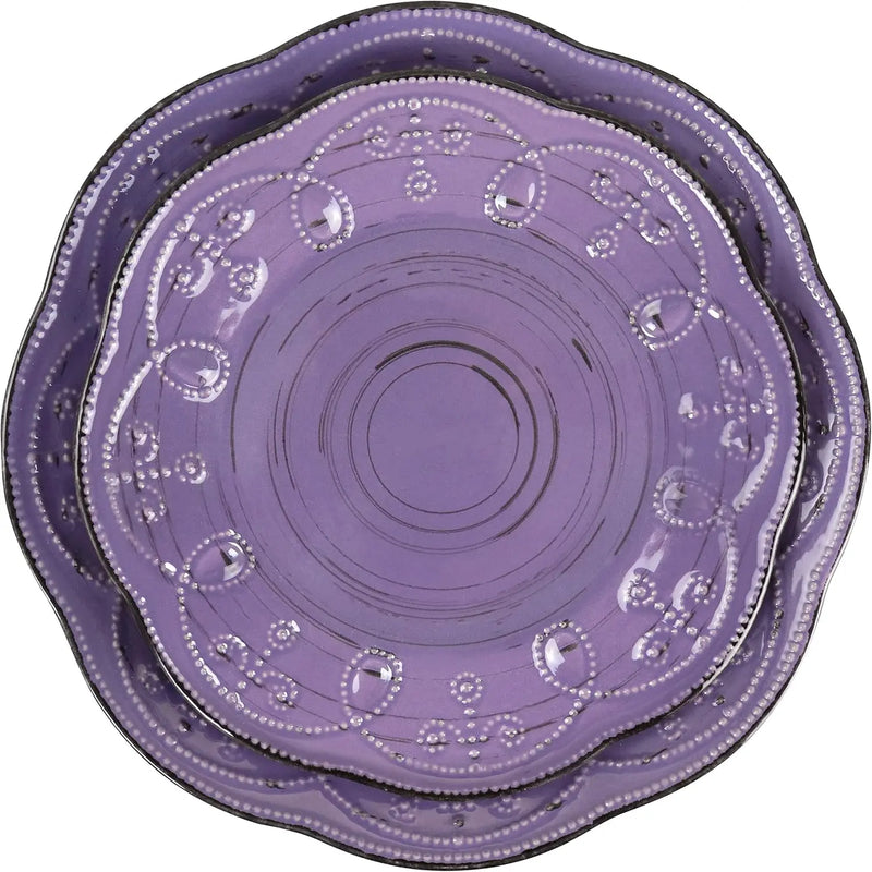 Set of purple decorative plates with intricate patterns on a white background