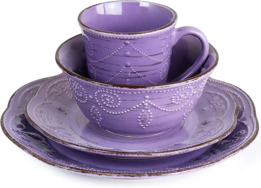 Purple ceramic dinnerware set on a white background