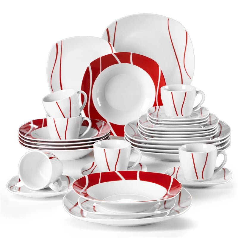 Ceramic dinnerware set with red and white design on a white background