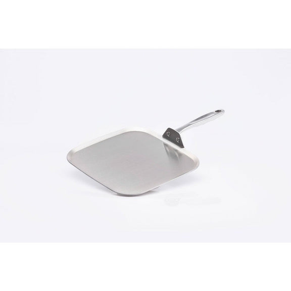 Metal spatula on a white background
