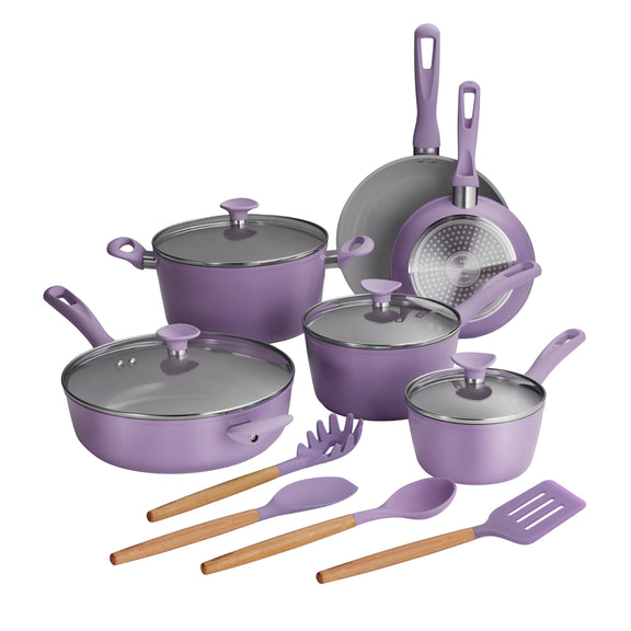 Purple cookware set with utensils on a white background