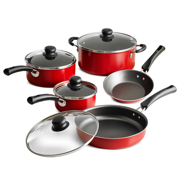 Set of red cookware with black handles on a white background