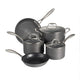 Set of gray cookware with lids on a white background