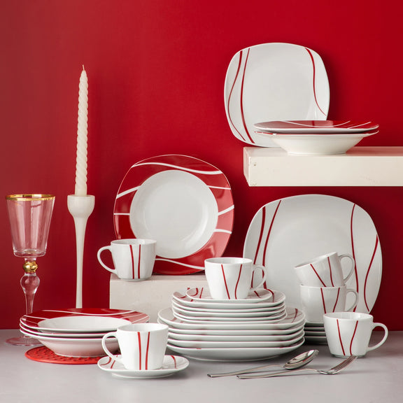 Dinnerware set with red and white stripes on a red background