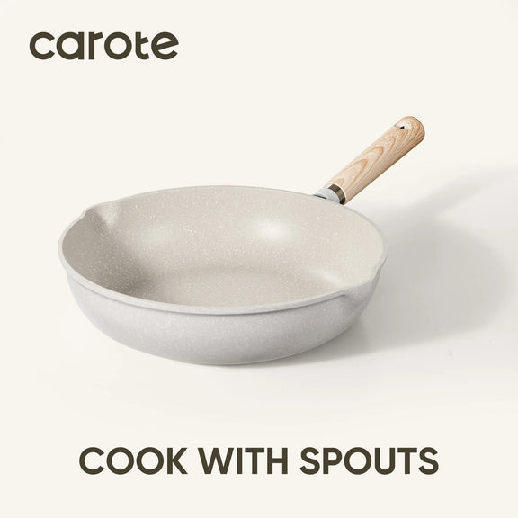 White frying pan with wooden handle on a white background, featuring the brand 'carote'.