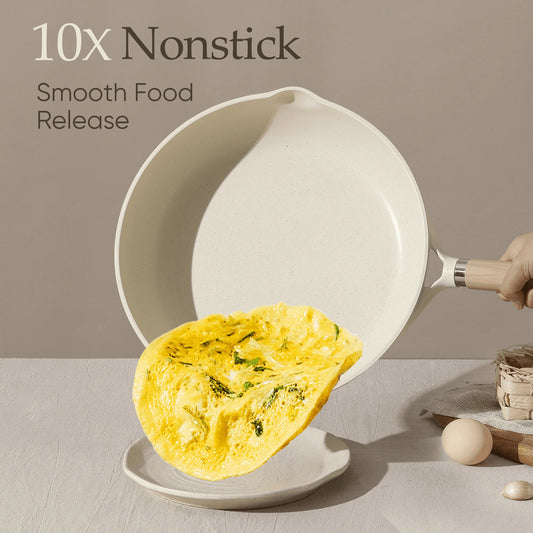 White frying pan with omelette on a neutral background, highlighting 10X nonstick 
