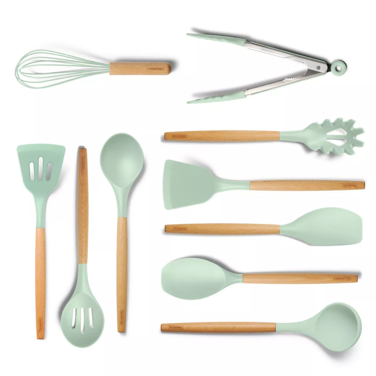 Set of kitchen utensils with green silicone heads and wooden handles on a white background
