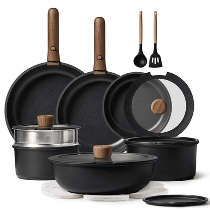 Set of black cookware with wooden handles and lids on a white background
