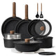 Set of black cookware with wooden handles and lids on a white background