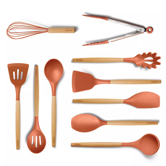 Set of kitchen utensils with orange silicone heads and wooden handles on a white background