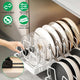 Dish rack with adjustable dividers and carbon steel features, shown in a kitchen setting.