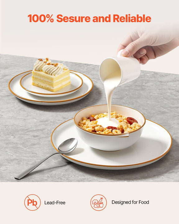 Person pouring milk into a bowl of cereal with a cake on a side plate, on a gray surface.