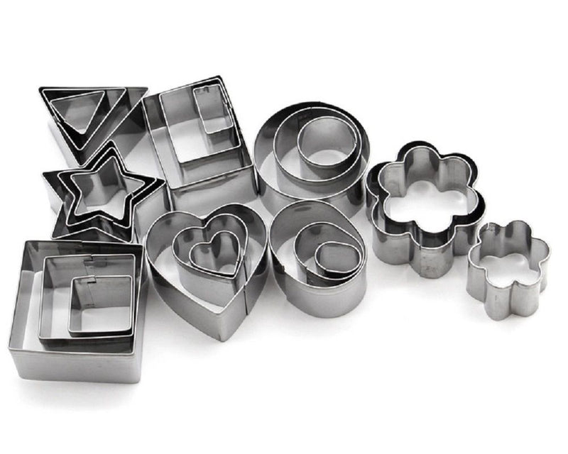 Set of metal cookie cutters in various shapes on a white background