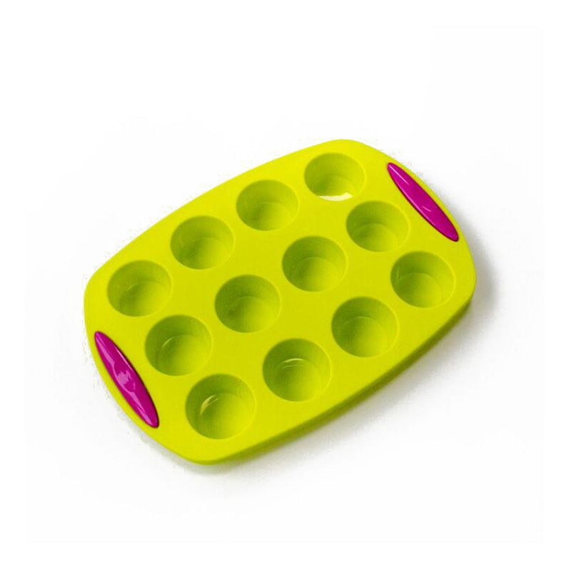 Green silicone mold with pink accents on a white background