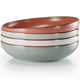 Set of four ceramic bowls with a gradient color pattern on a white background
