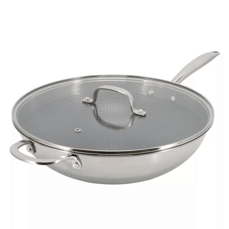 Stainless steel wok with lid on a white background