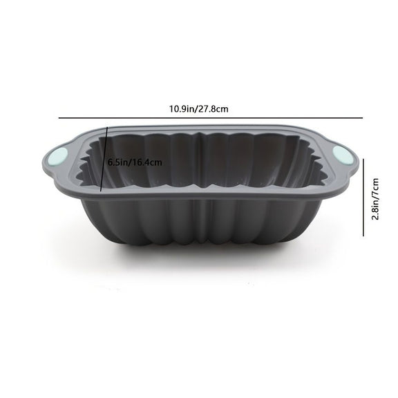 Gray silicone bread mold with measurements on a white background