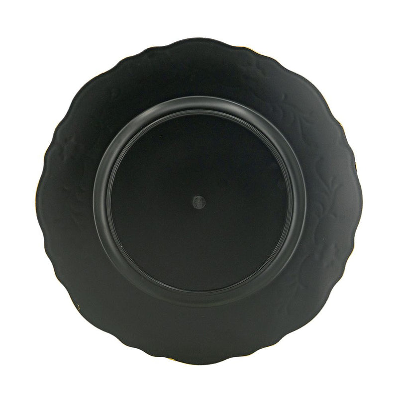 Black ceramic plate with decorative edge on a white background