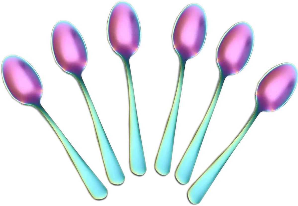 Set of six colorful spoons on a white background