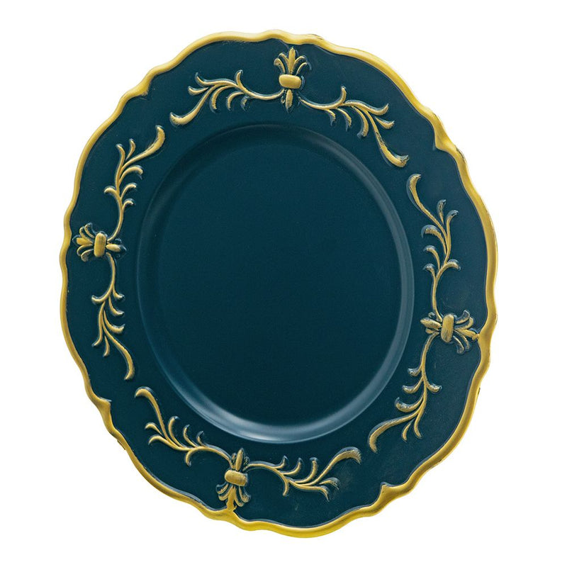 Decorative blue plate with gold intricate patterns on a white background