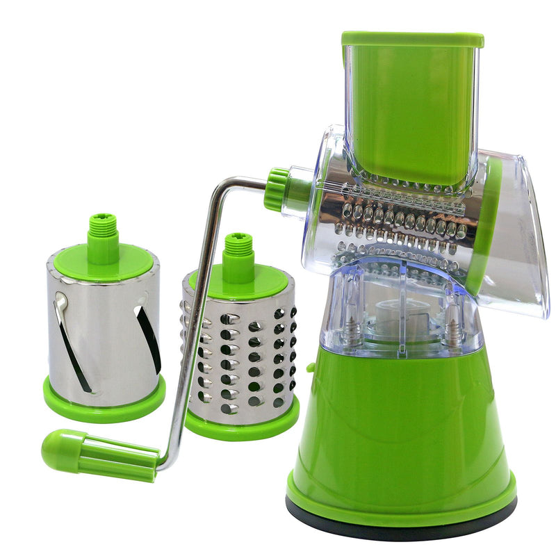 Green manual hand wind food grater and grater blades on white background