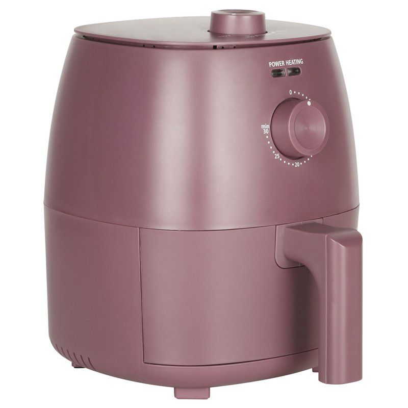 Maroon colored air fryer with a control knob on a white background