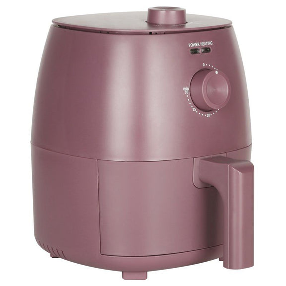 Maroon colored air fryer with a control knob on a white background