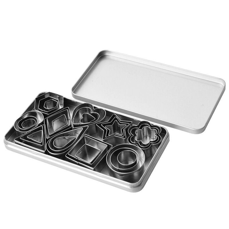 Set of metal cookie cutters in a tray with a lid on a white background