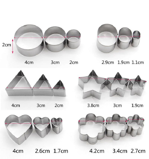 Set of metal cookie cutters with measurements on a white background