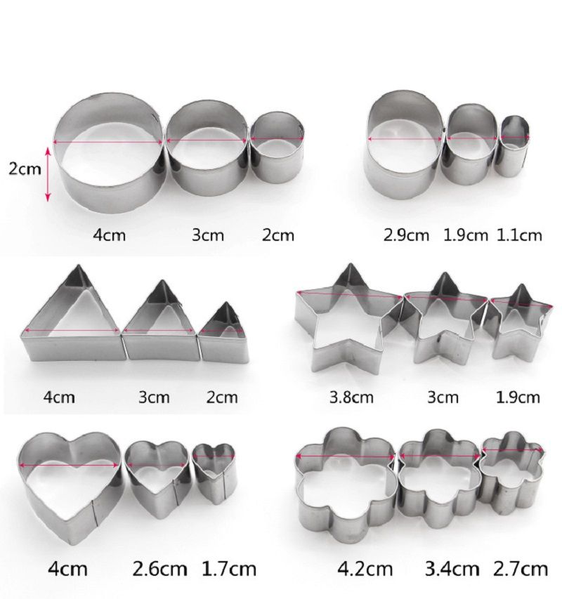 Set of metal cookie cutters with measurements on a white background