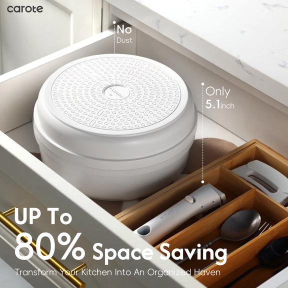 White round dutch oven with text highlighting space-saving feature in a kitchen drawer.