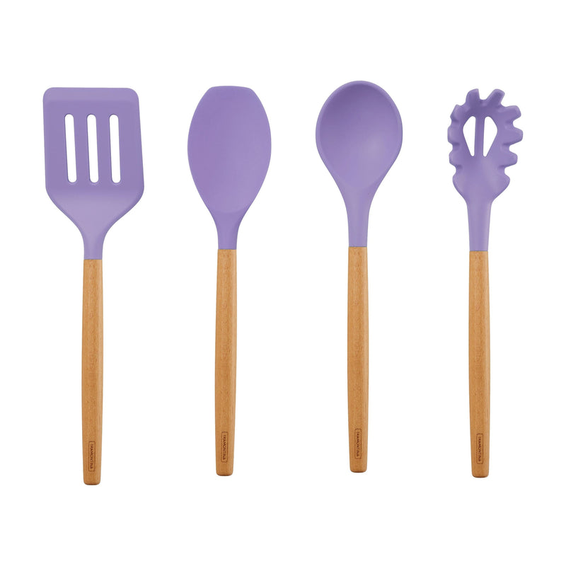 Set of four purple silicone kitchen utensils with wooden handles on a white background