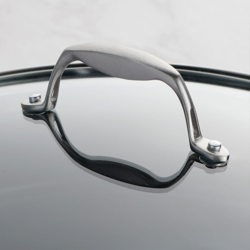Close-up of a pair of eyeglasses with a reflective surface