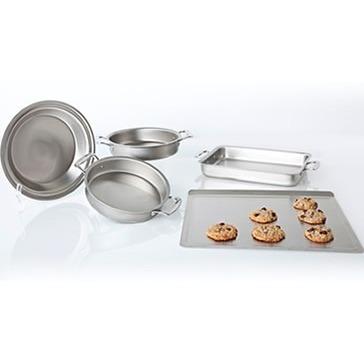 Set of stainless steel baking pans on a white background