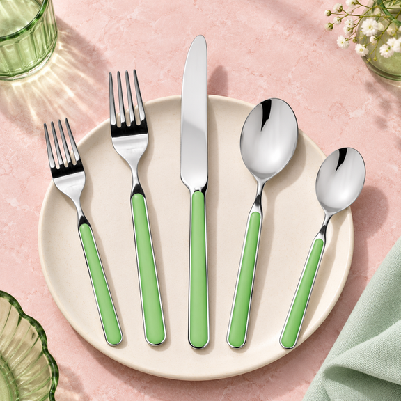 Mepra Fantasia Applegreen five-piece flatware on blush stone